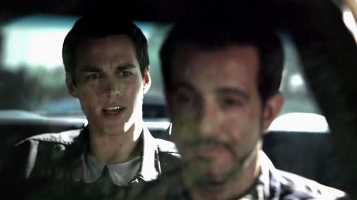 Kai in the backseat of a car