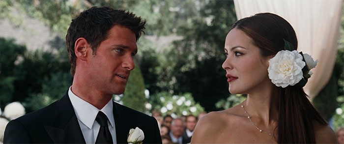 Scene from The Hangover showing a groom and bride at a wedding, highlighting the best wedding movies ever made.