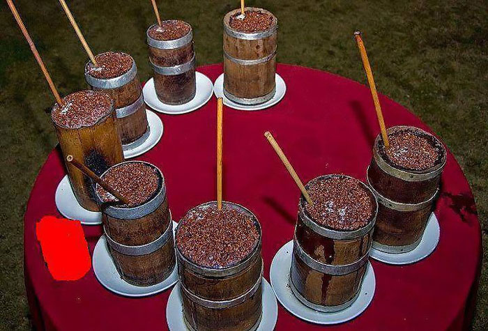 bevarages served in a barrel-shaped vessel