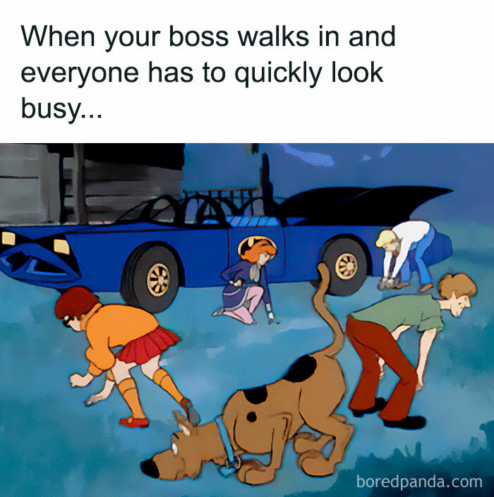 Cartoon characters pretend to work quickly when the boss arrives, capturing the humor of adult work life.