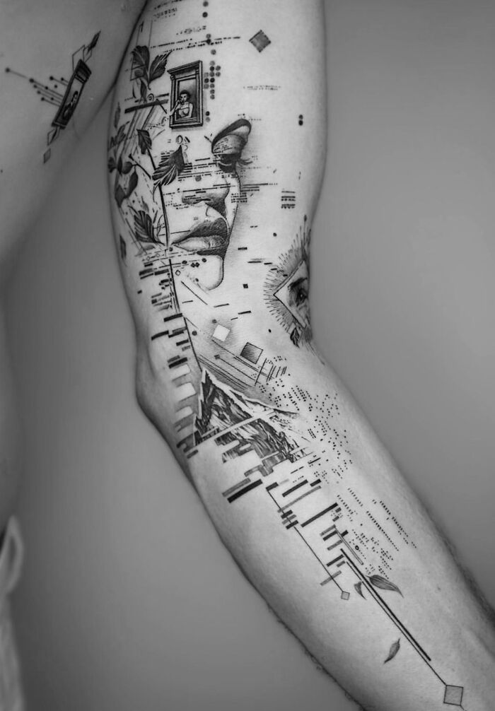 Geometric tattoo art with abstract shapes and intricate design on forearm.