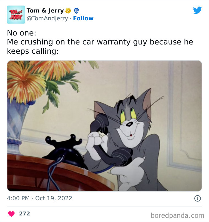 Tom from Tom & Jerry holding a phone, looking smitten.