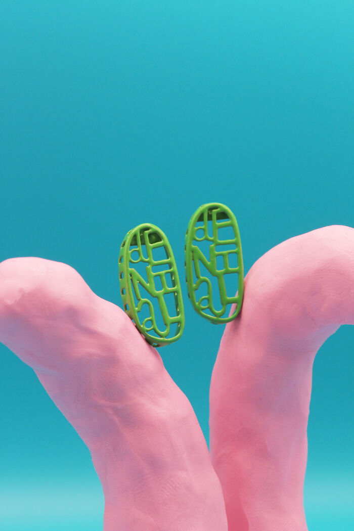 'denial' Earrings In Green