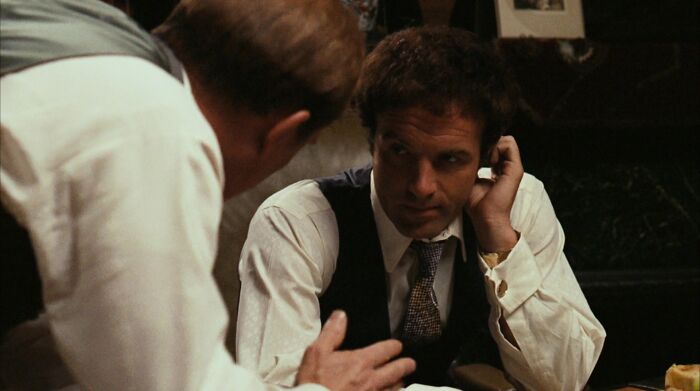 Santino Corleone talking and scratching head 