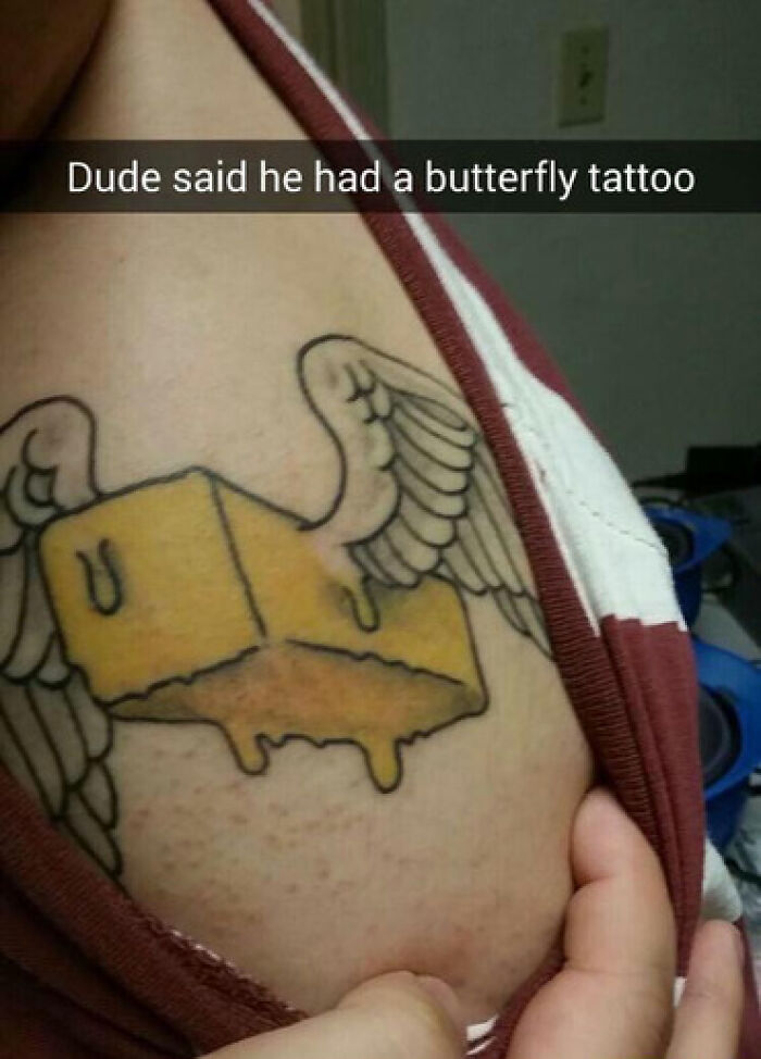 Tattoo fail showing a stick of butter with wings instead of a butterfly on a person's chest.