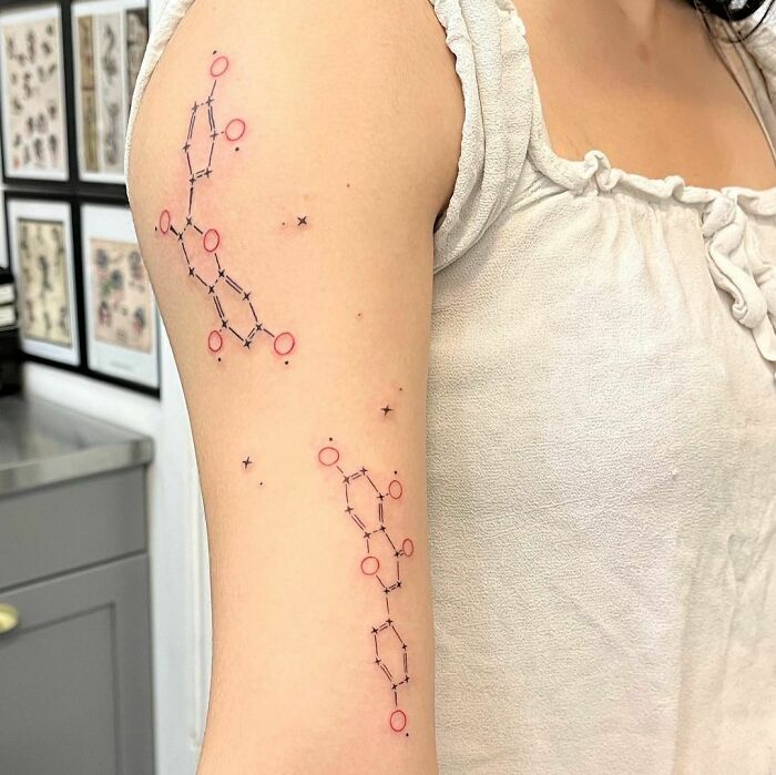 Science tattoos featuring DNA molecule design on arm, perfect for aspiring scientists.