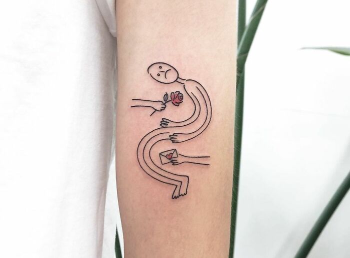 Minimalist mental health tattoo of a figure holding a rose and an envelope on an arm.