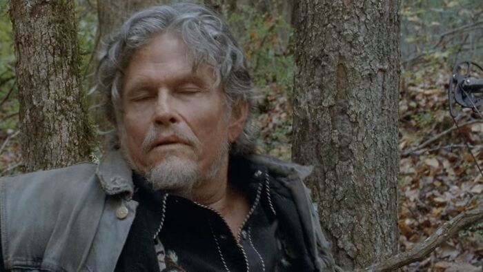 Joe sitting in forest 