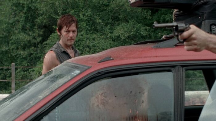 Daryl Dixon looking towards the gun