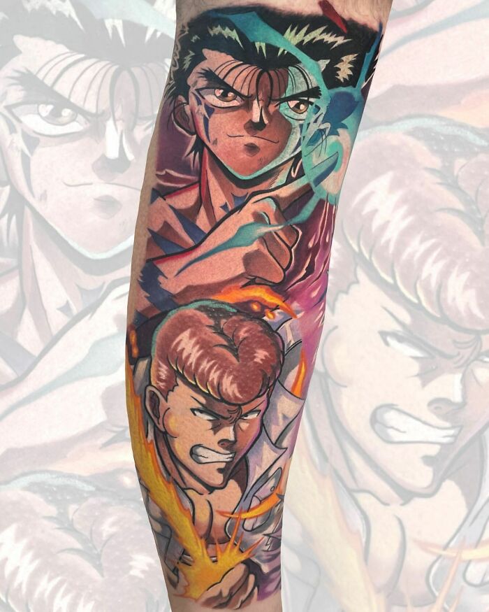 Vibrant anime tattoo featuring two intense characters in action, showcasing dynamic artwork and vivid colors.
