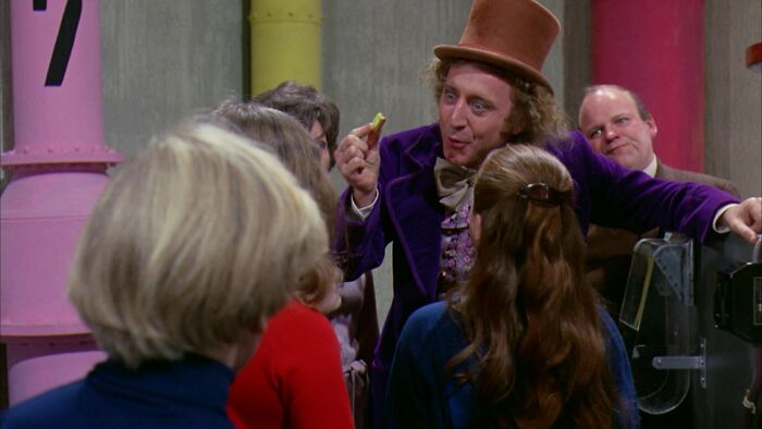 W***y Wonka showing gum to the kids 