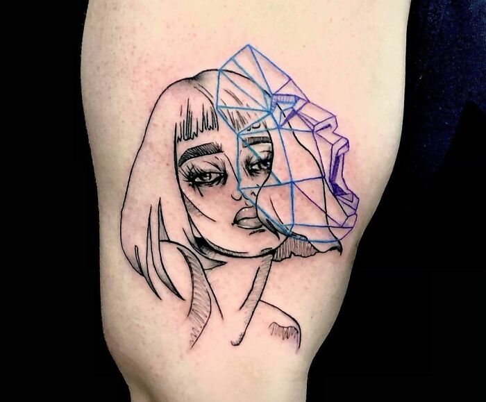Abstract face tattoo blending line art and geometric shapes, symbolizing mental health healing.