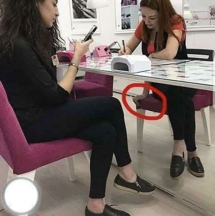 Two Women With An Extra Arm