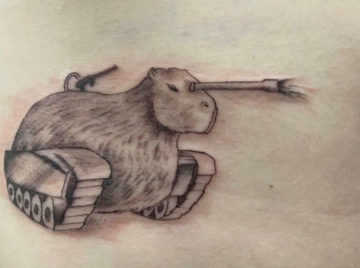 Tattoo of a capybara with a tank body, highlighting inked mistakes in creative designs.