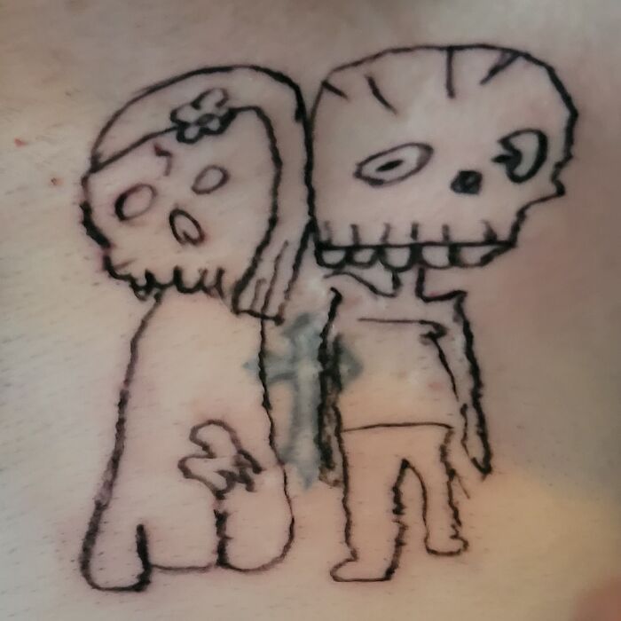 Childlike skeleton tattoo on skin, highlighting common permanent tattoo mistakes people make.