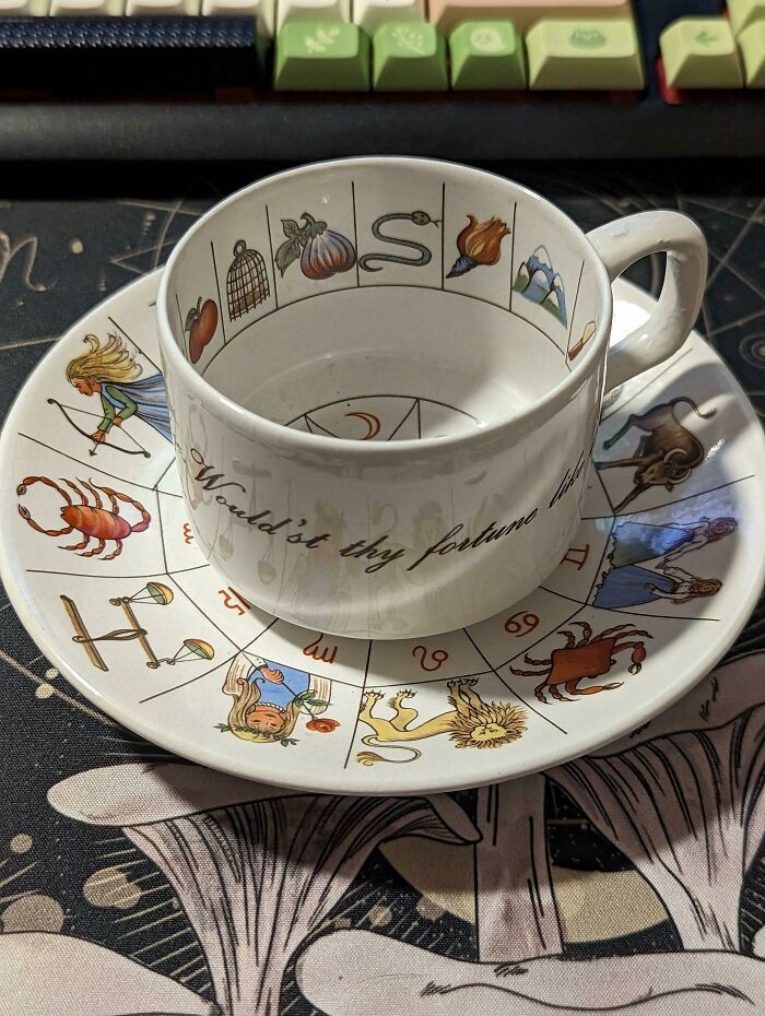 Astrology-themed mug and saucer set featuring zodiac signs and symbols, showcasing creative mug life design.