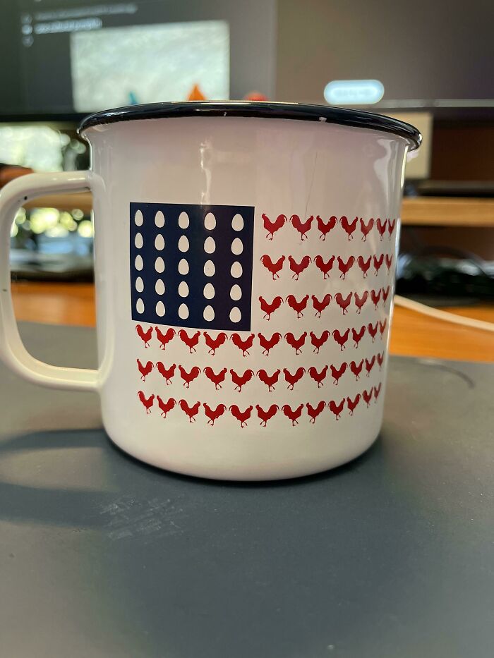 White mug with a chicken and egg design arranged like a flag, showcasing creative mug life and unique decor elements.