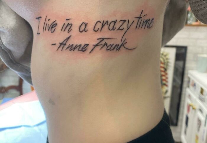 Embarrassing tattoo quote attributed to Anne Frank on someone's side rib.