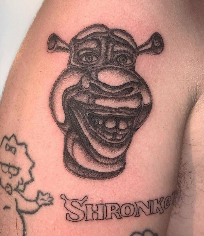 "Cartoon character tattoo featuring exaggerated features, labeled 'Shronker,' illustrating one of many unthought-through tattoos."