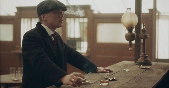 Tommy Shelby smoking a cigarette 