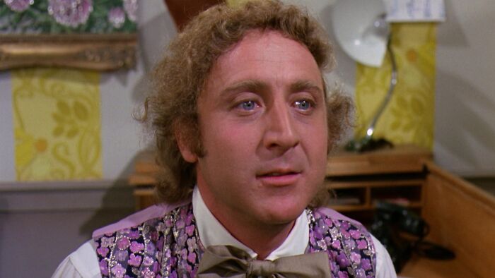 W***y Wonka wearing violet vest 