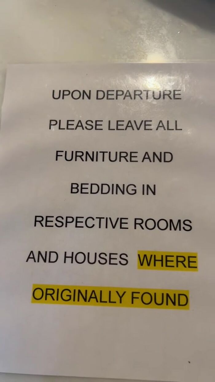 Note with rules in an Airbnb instructing guests to leave furniture and bedding in their original rooms upon departure.