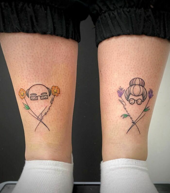 Minimalist tattoos on legs symbolizing grandparents, featuring glasses and floral elements to honor family.
