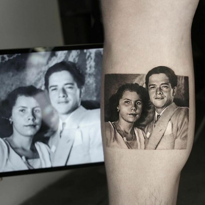 Family memorial tattoo of a vintage photo on skin, showcasing a couple in formal attire.