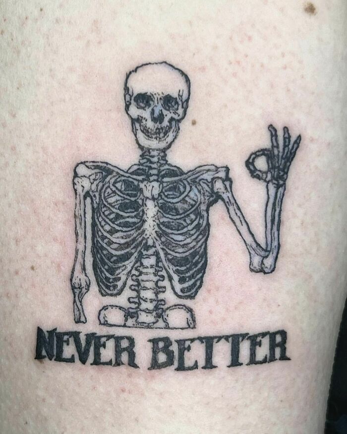 Skeleton tattoo with the phrase "NEVER BETTER" representing mental health resilience.