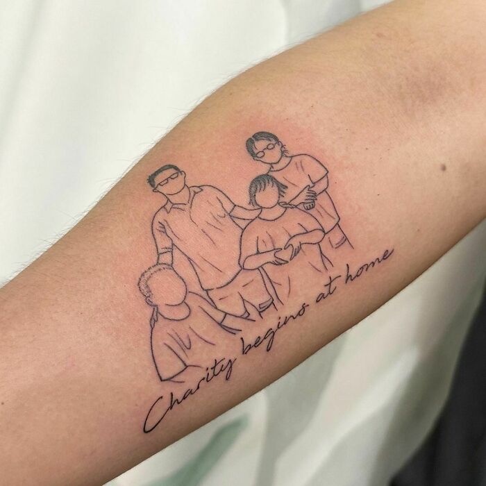 Family memorial tattoo on arm with outline of four people and text "Charity begins at home."
