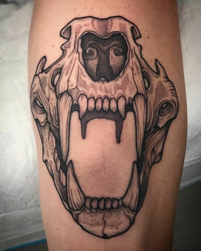 Tattoo of a detailed animal skull design on an elbow, showcasing unique ideas for elbow tattoos.