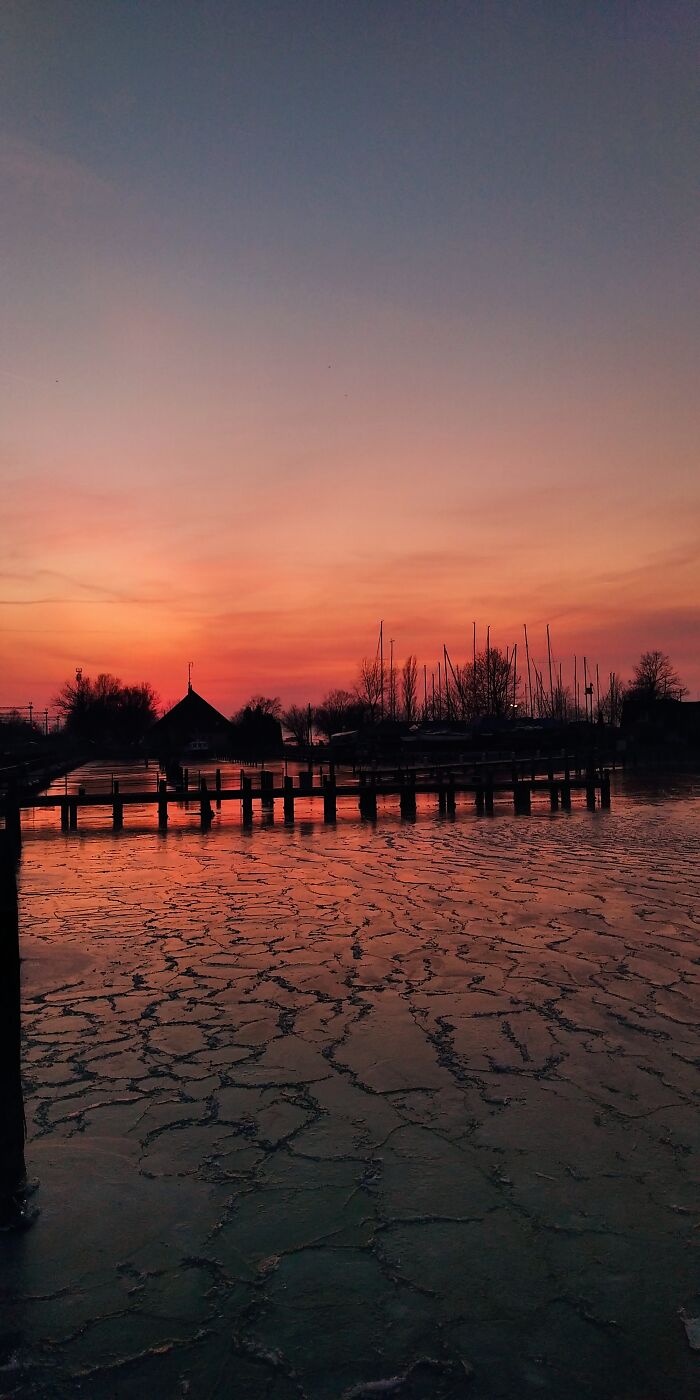 Winter Sunset Above The Frozen Lake Balaton, Hungary