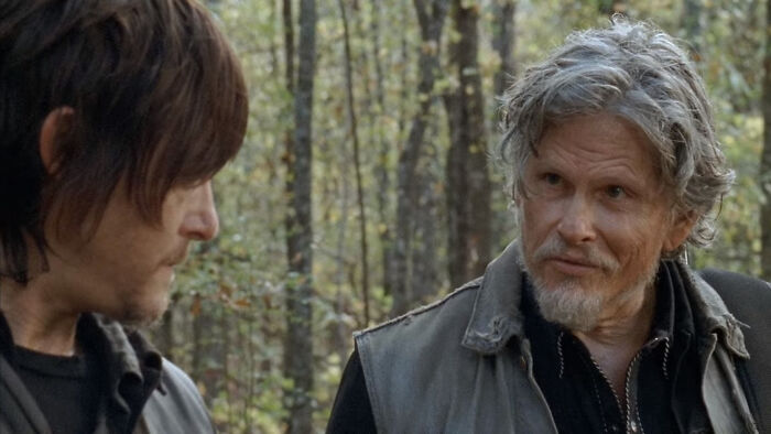 Joe lookinh towards Daryl Dixon