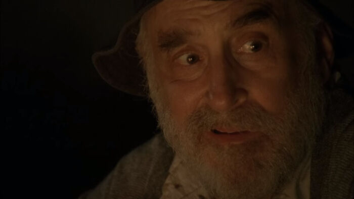 Dale Horvath sitting net to the fire