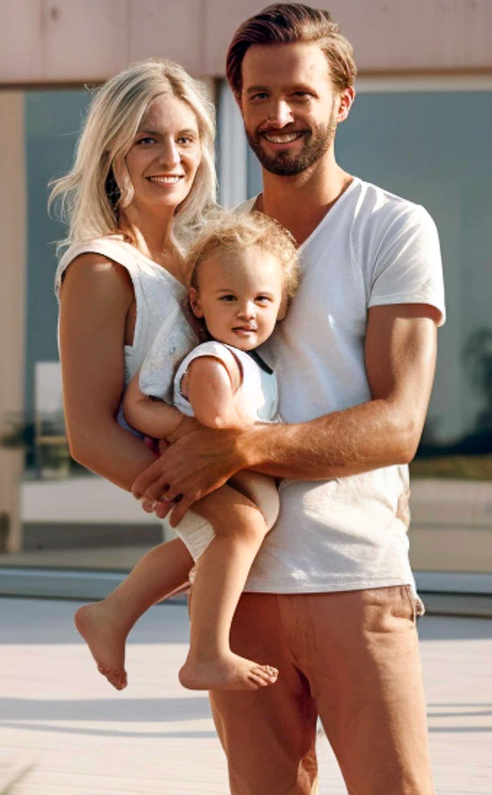 Family posing outdoors with child smiling; example of AI art fail with odd features.