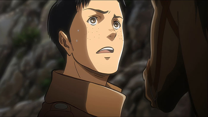 Marco Bott wearing brown jacket