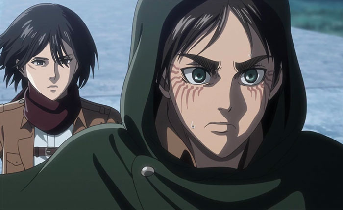 Eren Yeager wearing green hoodie