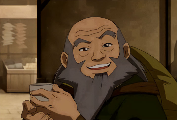 Uncle Iroh smiling warmly while holding a cup of tea, representing legendary Avatar The Last Airbender quotes.