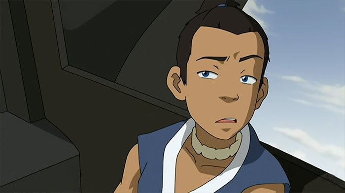 Sokka from Avatar The Last Airbender speaking thoughtfully against a clear sky background in an animated scene.