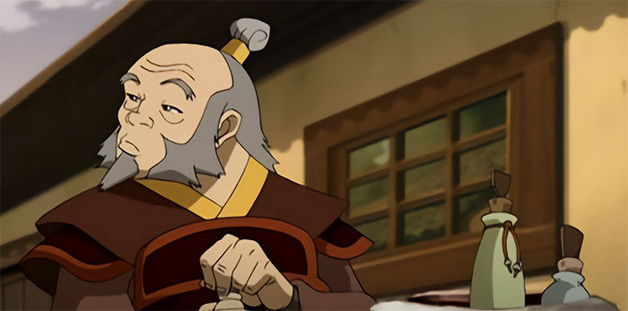 Uncle Iroh from Avatar The Last Airbender looking curious with traditional attire near a wooden window and ceramic bottles.