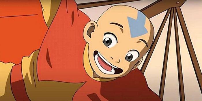 Aang smiling happily in a scene from Avatar The Last Airbender featuring legendary quotes and memorable moments.