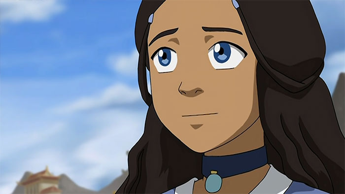 Katara looking upset with blue eyes and brown hair, a memorable moment from Avatar The Last Airbender quotes.