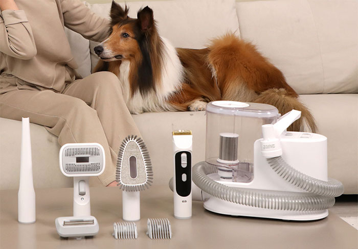 Picture of Whall pet grooming vacuum near dog and owner on amazon