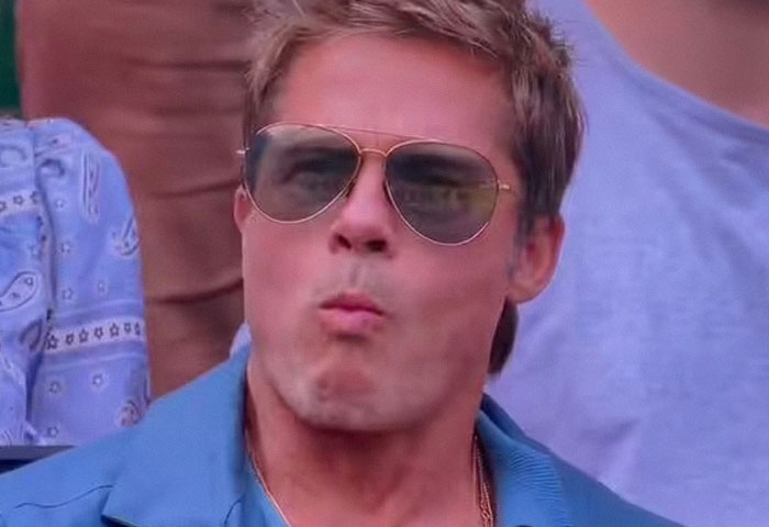 Man in sunglasses at Wimbledon, surprising fans with youthful appearance.