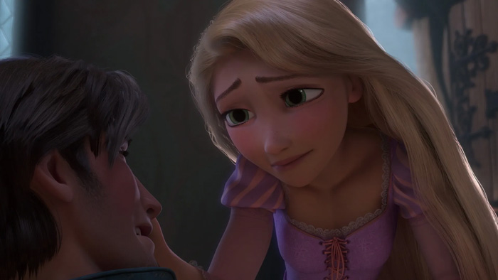 Rapunzel looking sadly at Flynn Rider