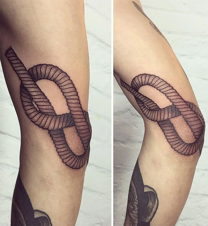 Rope knot design tattoo on the elbow showcasing intricate shading and bold lines.