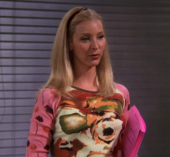 Phoebe holding pink sheets of paper 