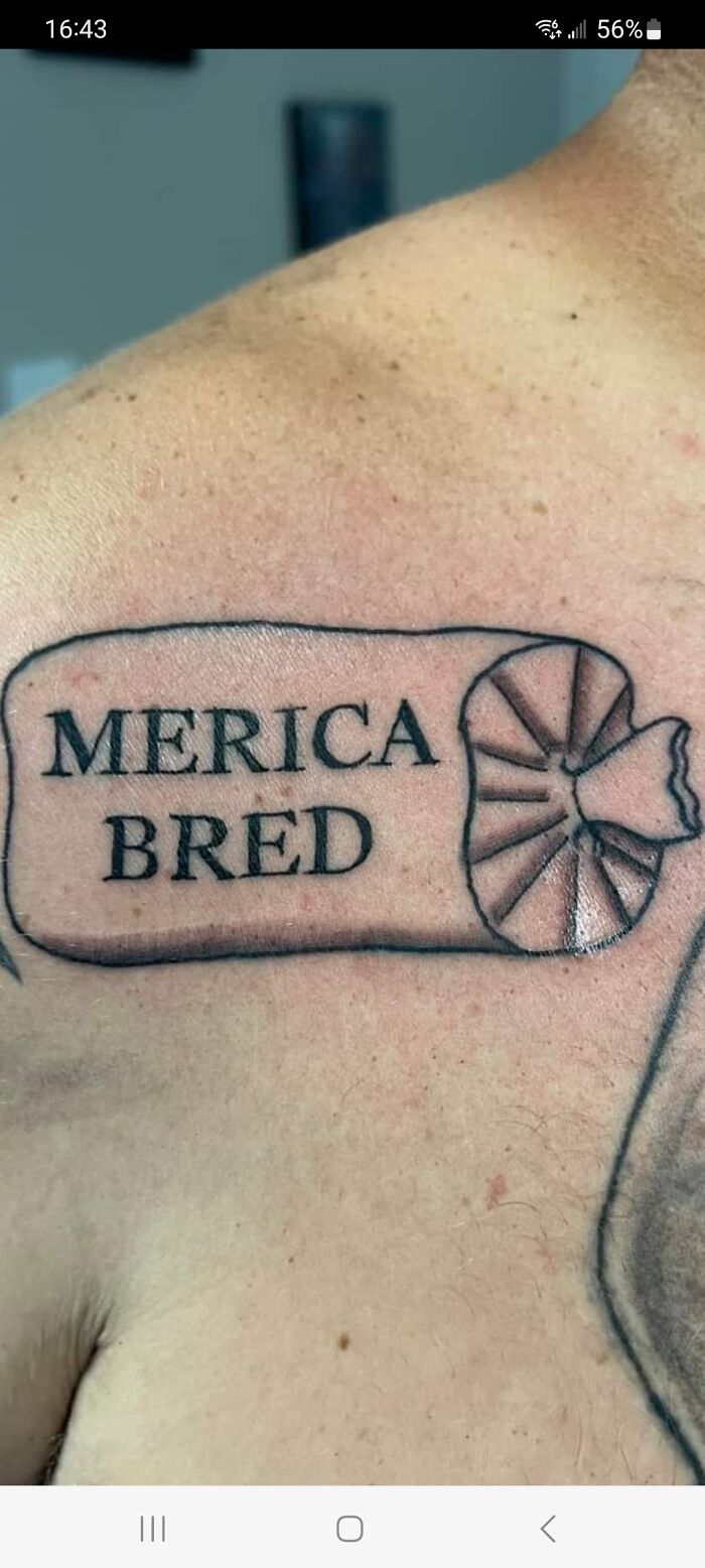 Tattoo of bread with the text "Merica Bred" misspelled, highlighting a humorous tattoo fail.