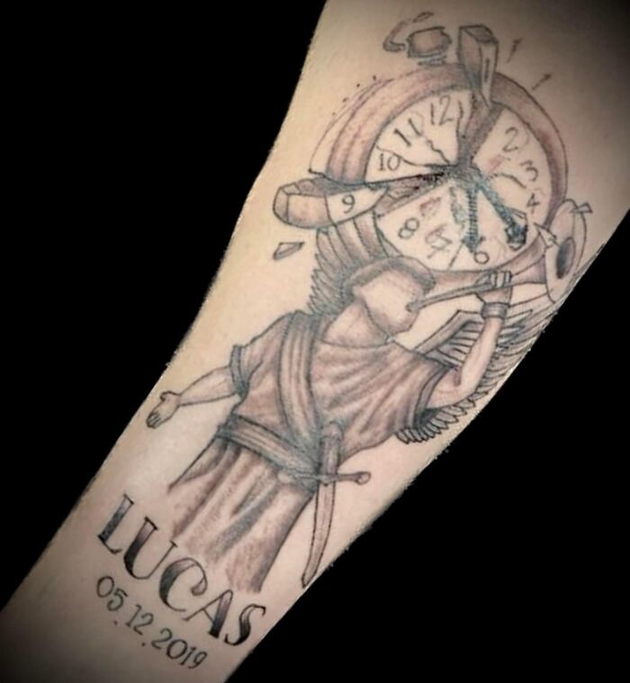 Worst tattoos: An angel with a broken clock and "Lucas" with date, etched on forearm.