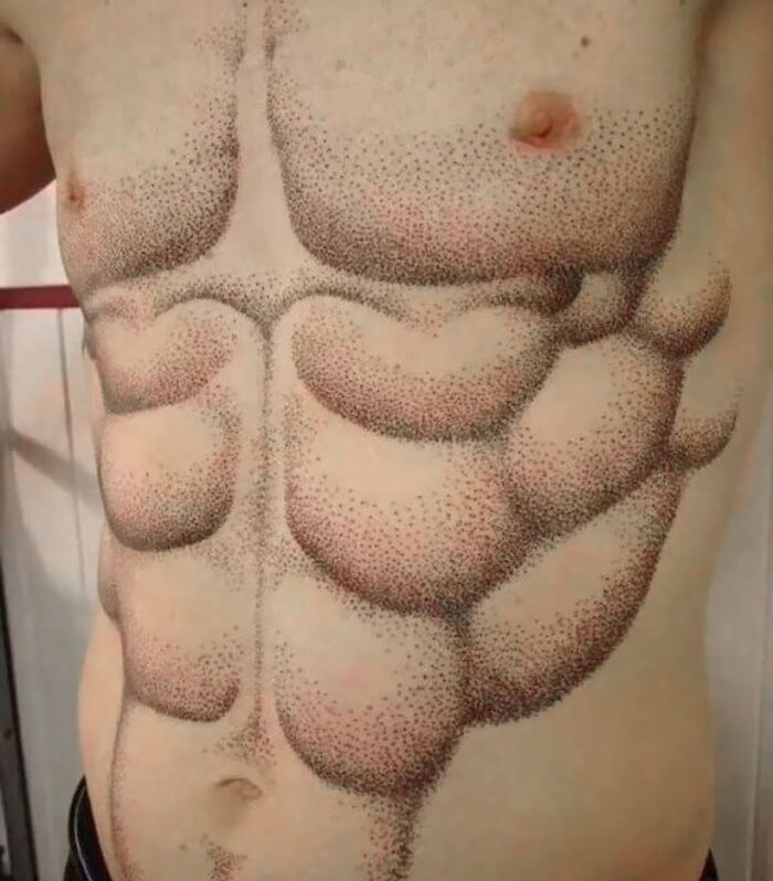 Tattoo of a dotted six-pack on the torso, illustrating a bold choice in getting inked.